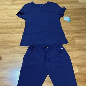 Cherokee Infinity Large navy scrub top and pants.